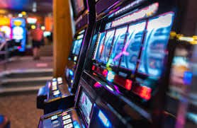 Slot game interface showing Aviator and Sweet Bonanza titles